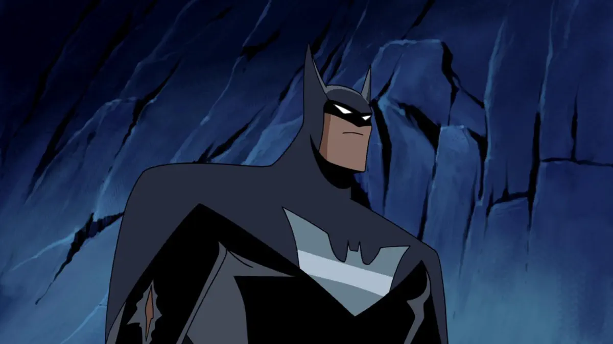 Justice Lord Batman wearing his alternate black-and-gray suit in A Better World, Part 2.